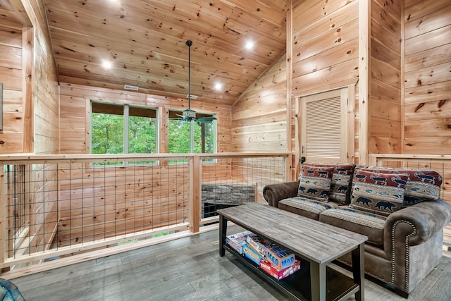 living room with wooden ceiling, hardwood / wood-style flooring, high vaulted ceiling, and wooden walls