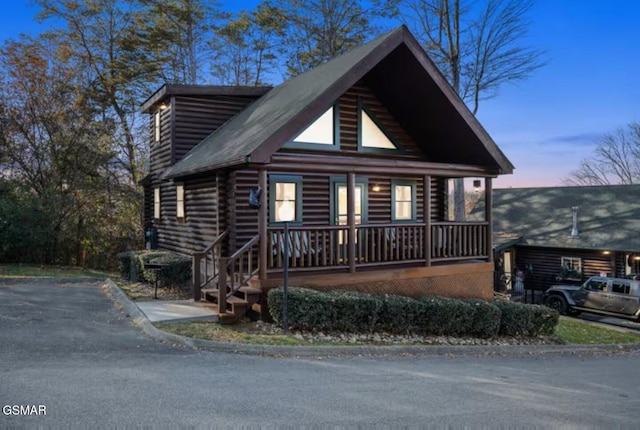 232 Moose Ridge Way, Pigeon Forge, TN 37863 - log home featuring log exterior and covered porch