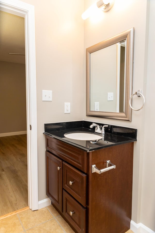 bathroom featuring tile patterned floors and vanity