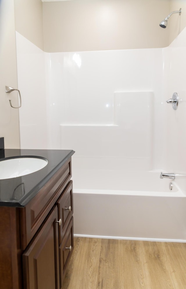 bathroom featuring hardwood / wood-style floors and vanity