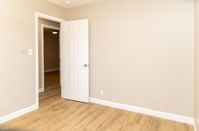 unfurnished room featuring light hardwood / wood-style floors