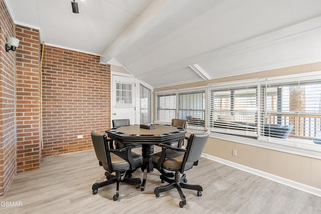 sunroom / solarium with lofted ceiling with beams