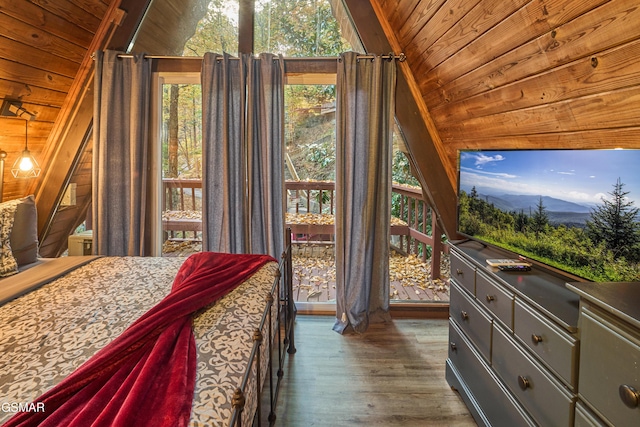 bedroom featuring lofted ceiling, wood walls, dark hardwood / wood-style flooring, and wood ceiling