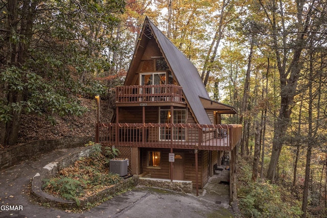 back of house with a patio area, central AC unit, and a deck