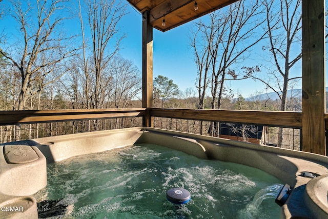 deck with a hot tub