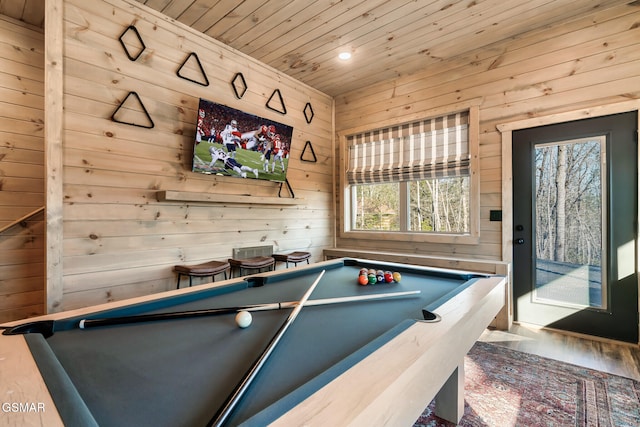 game room featuring wooden ceiling, hardwood / wood-style flooring, wooden walls, and billiards