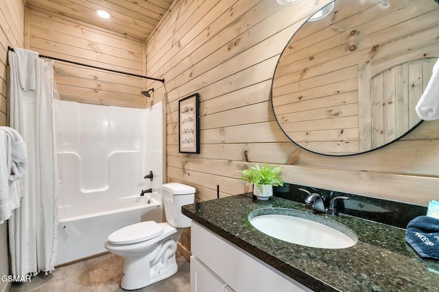 full bathroom with vanity, shower / bath combo, toilet, and wooden walls