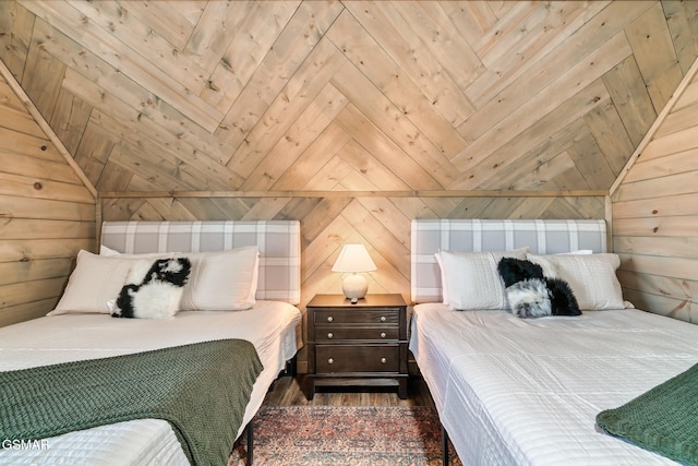 bedroom with wood walls, wooden ceiling, and dark wood-type flooring