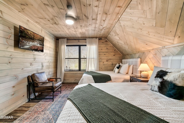 bedroom with dark hardwood / wood-style flooring, wooden ceiling, wooden walls, and vaulted ceiling