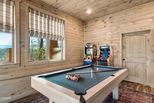 game room with wood walls, wooden ceiling, hardwood / wood-style flooring, and pool table