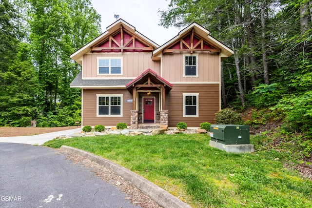1128 Anastasia Way, Gatlinburg, TN 37738 - craftsman inspired home with a front lawn and board and batten siding