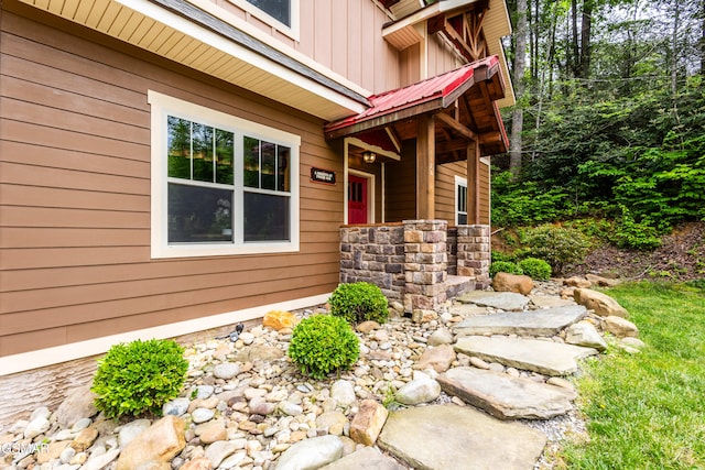 1128 Anastasia Way, Gatlinburg, TN 37738 - doorway to property with board and batten siding and stone siding