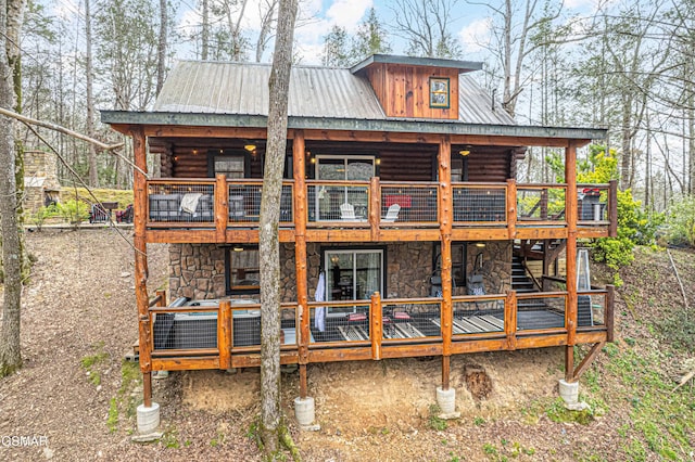 3115 E E Pkwy, Gatlinburg, TN 37738 - rear view of property featuring stone siding, log siding, and metal roof