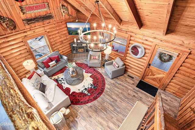 3115 E E Pkwy, Gatlinburg, TN 37738 - living room with wooden ceiling, an inviting chandelier, beamed ceiling, and wood finished floors