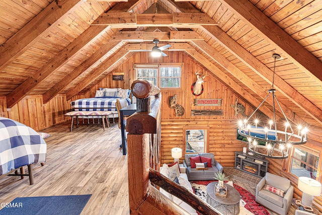 3115 E E Pkwy, Gatlinburg, TN 37738 - bedroom featuring lofted ceiling with beams, wooden ceiling, wood finished floors, and a chandelier