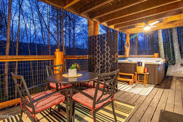 3115 E E Pkwy, Gatlinburg, TN 37738 - deck featuring ceiling fan, a hot tub, and outdoor dining area