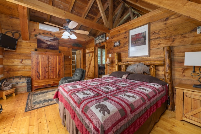 bedroom featuring wood ceiling, ceiling fan, light hardwood / wood-style flooring, vaulted ceiling with beams, and wood walls