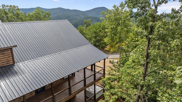 view of side of home featuring a mountain view