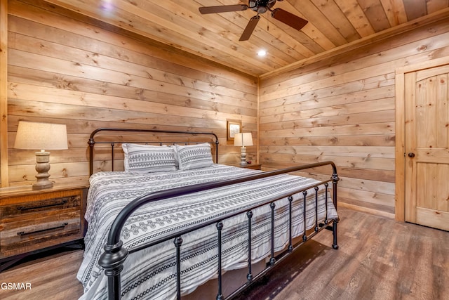 2862 Indigo Ln, Sevierville, TN 37862 - bedroom featuring wooden ceiling, wood finished floors, wood walls, recessed lighting, and a ceiling fan