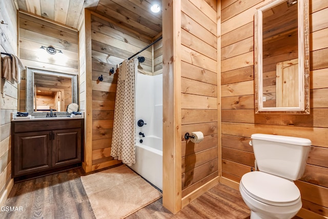 2862 Indigo Ln, Sevierville, TN 37862 - full bathroom with wooden walls, wood finished floors, shower / bath combo, wood ceiling, and toilet
