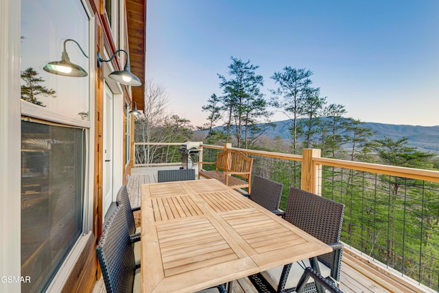 2862 Indigo Ln, Sevierville, TN 37862 - wooden terrace featuring outdoor dining space and a mountain view