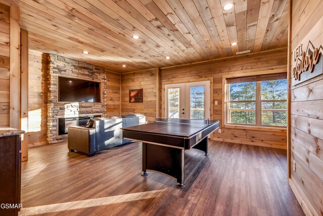 2862 Indigo Ln, Sevierville, TN 37862 - recreation room with wooden ceiling, french doors, wood walls, dark wood-style flooring, and recessed lighting