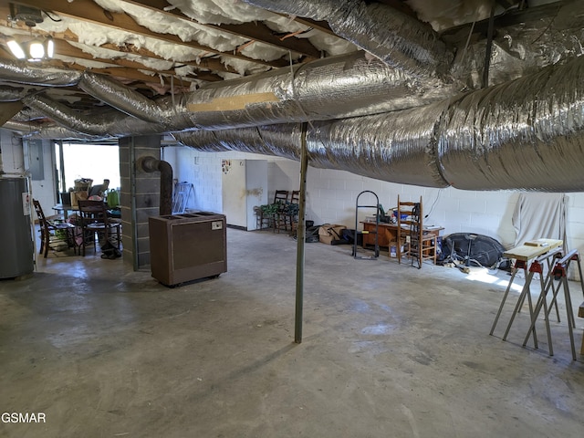 basement featuring electric water heater