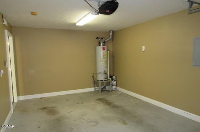 garage with a garage door opener and water heater