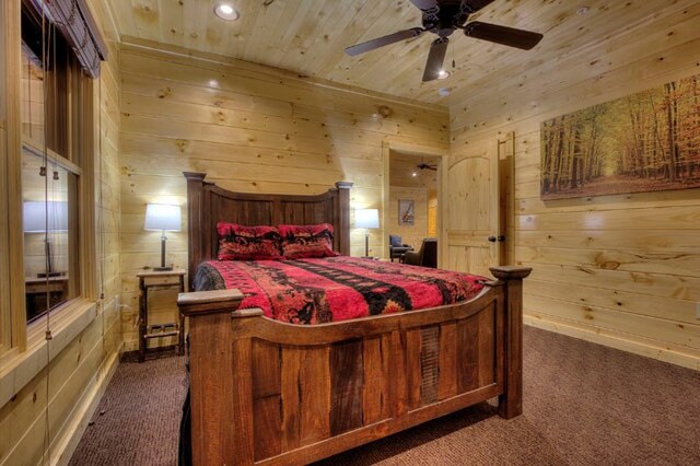 carpeted bedroom featuring ceiling fan, wooden walls, and wood ceiling