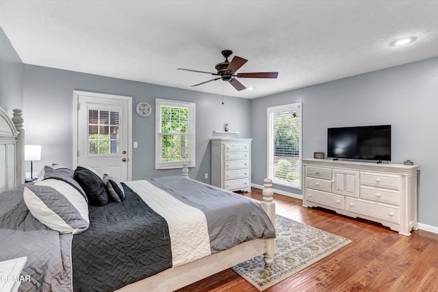 bedroom with recessed lighting, baseboards, ceiling fan, and wood finished floors