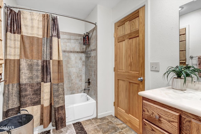 bathroom featuring vanity and shower / tub combo
