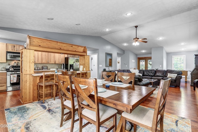 dining area featuring recessed lighting, a ceiling fan, light wood-type flooring, and lofted ceiling