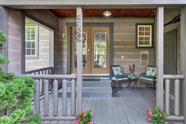 doorway to property with a porch