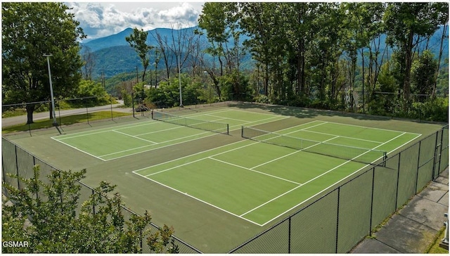 view of sport court featuring a mountain view