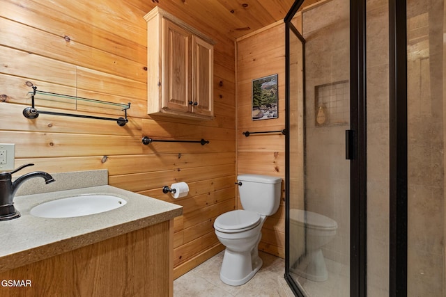 bathroom with vanity, wooden ceiling, tile patterned floors, wooden walls, and toilet