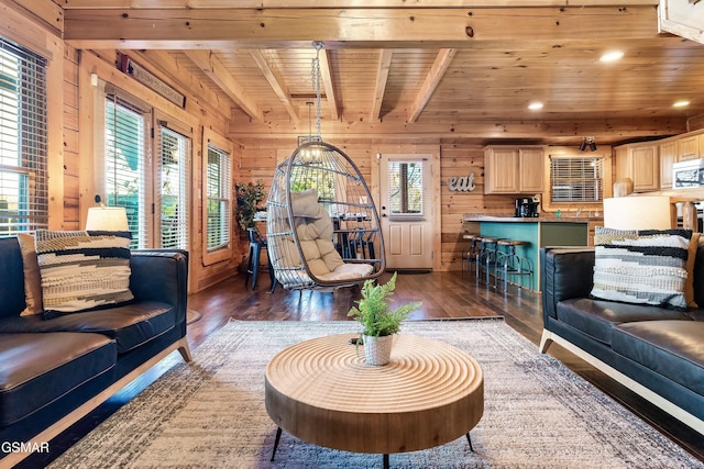 living room featuring beam ceiling, dark hardwood / wood-style floors, wooden ceiling, and wooden walls