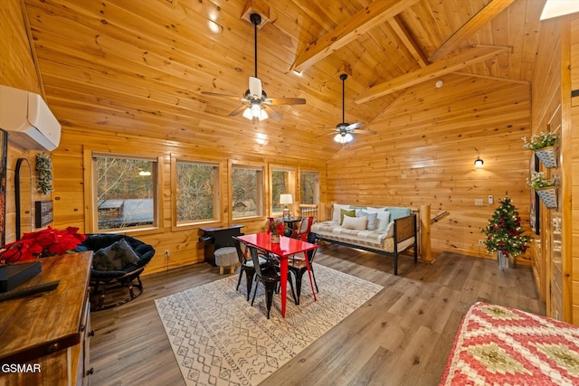 dining area with ceiling fan, high vaulted ceiling, beamed ceiling, a wall unit AC, and hardwood / wood-style floors