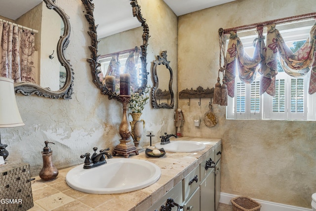 bathroom featuring vanity