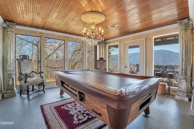 playroom featuring a mountain view, billiards, concrete floors, and wooden ceiling