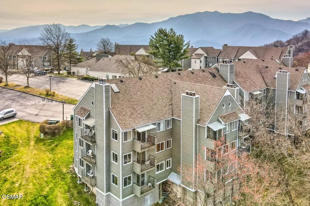 aerial view featuring a residential view and a mountain view