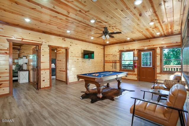 game room with wooden walls, wood-type flooring, wooden ceiling, and pool table