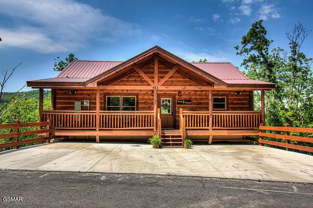 log home with a porch