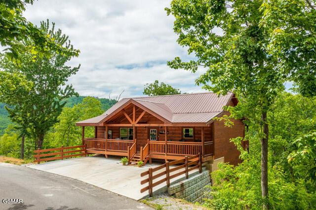 view of log cabin