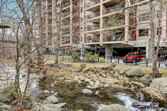 view of building exterior with a water view