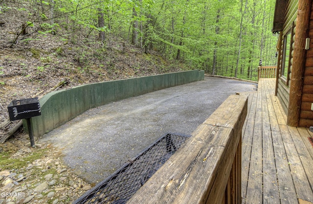 3050 Headrick Dr, Sevierville, TN 37862 - wooden deck featuring a wooded view
