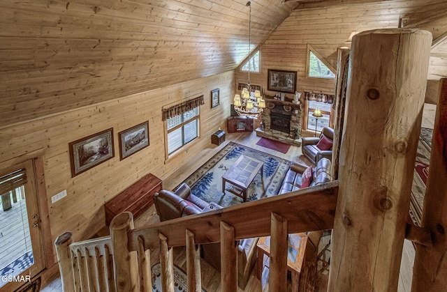 3050 Headrick Dr, Sevierville, TN 37862 - living area with wooden walls, wood ceiling, and lofted ceiling