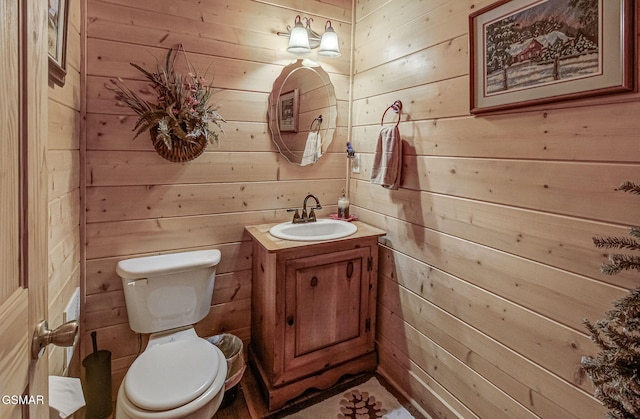 3050 Headrick Dr, Sevierville, TN 37862 - half bathroom with vanity and wooden walls