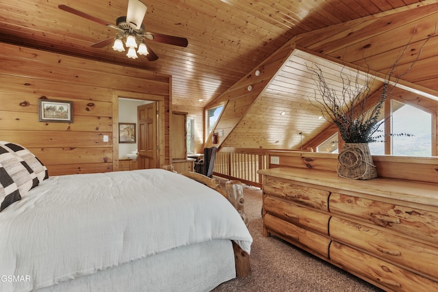 2851 Indigo Ln, Sevierville, TN 37862 - bedroom with vaulted ceiling, wooden walls, ceiling fan, wooden ceiling, and carpet flooring