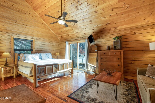 bedroom with light hardwood / wood-style floors, wood ceiling, multiple windows, and ceiling fan