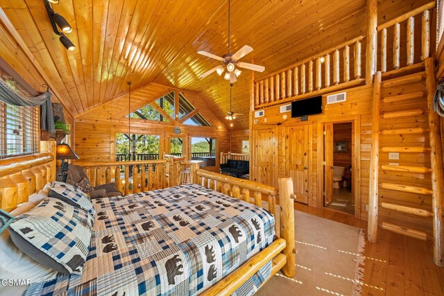 bedroom featuring wood walls, wooden ceiling, and high vaulted ceiling